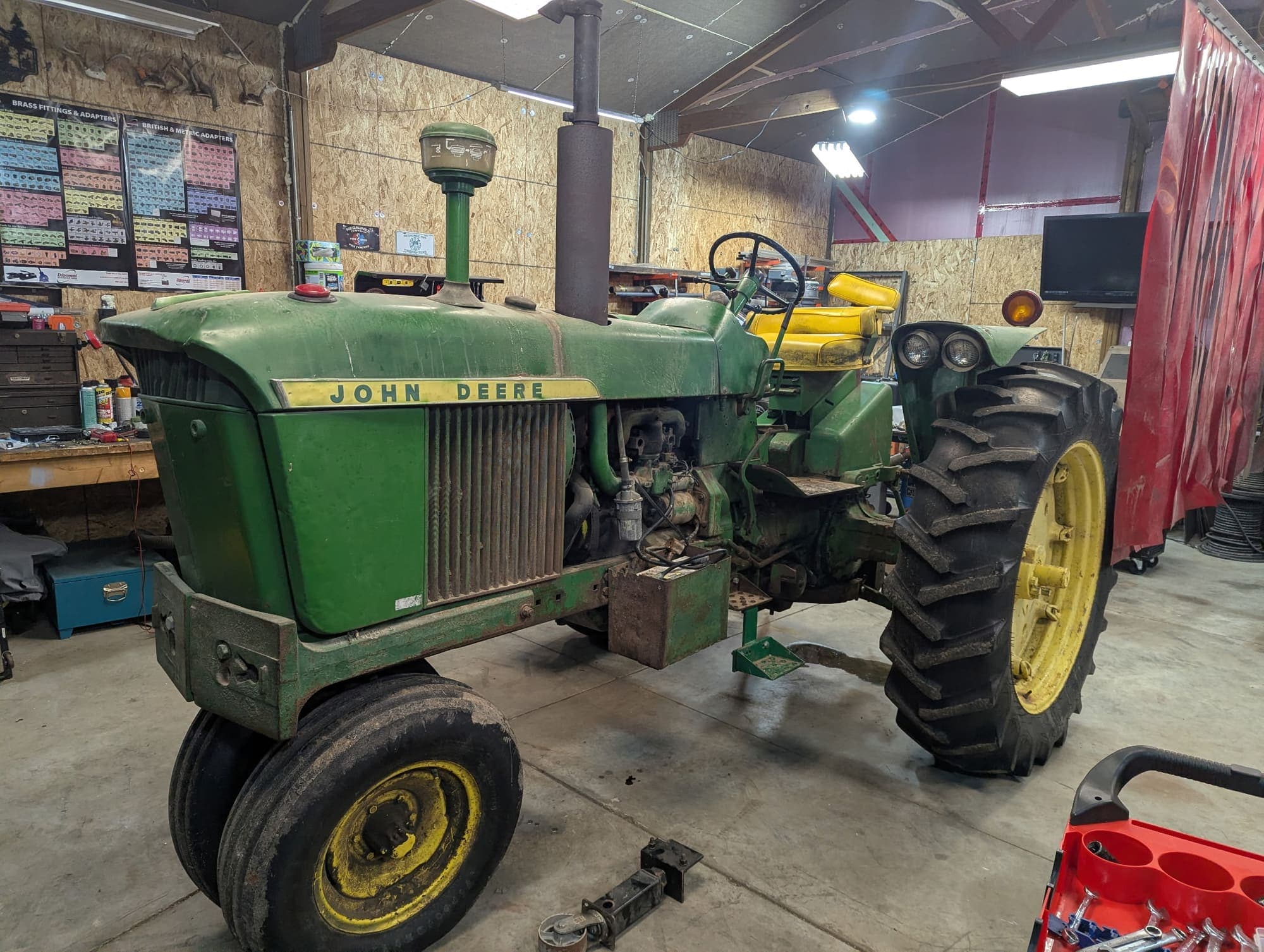 The 3010 in the shop as it arrived, faded paint and grime